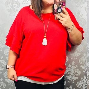 Red blouse with ruffle sleeves